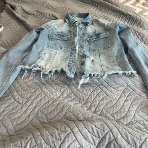 Women’s white washed distressed cut off jean jacket